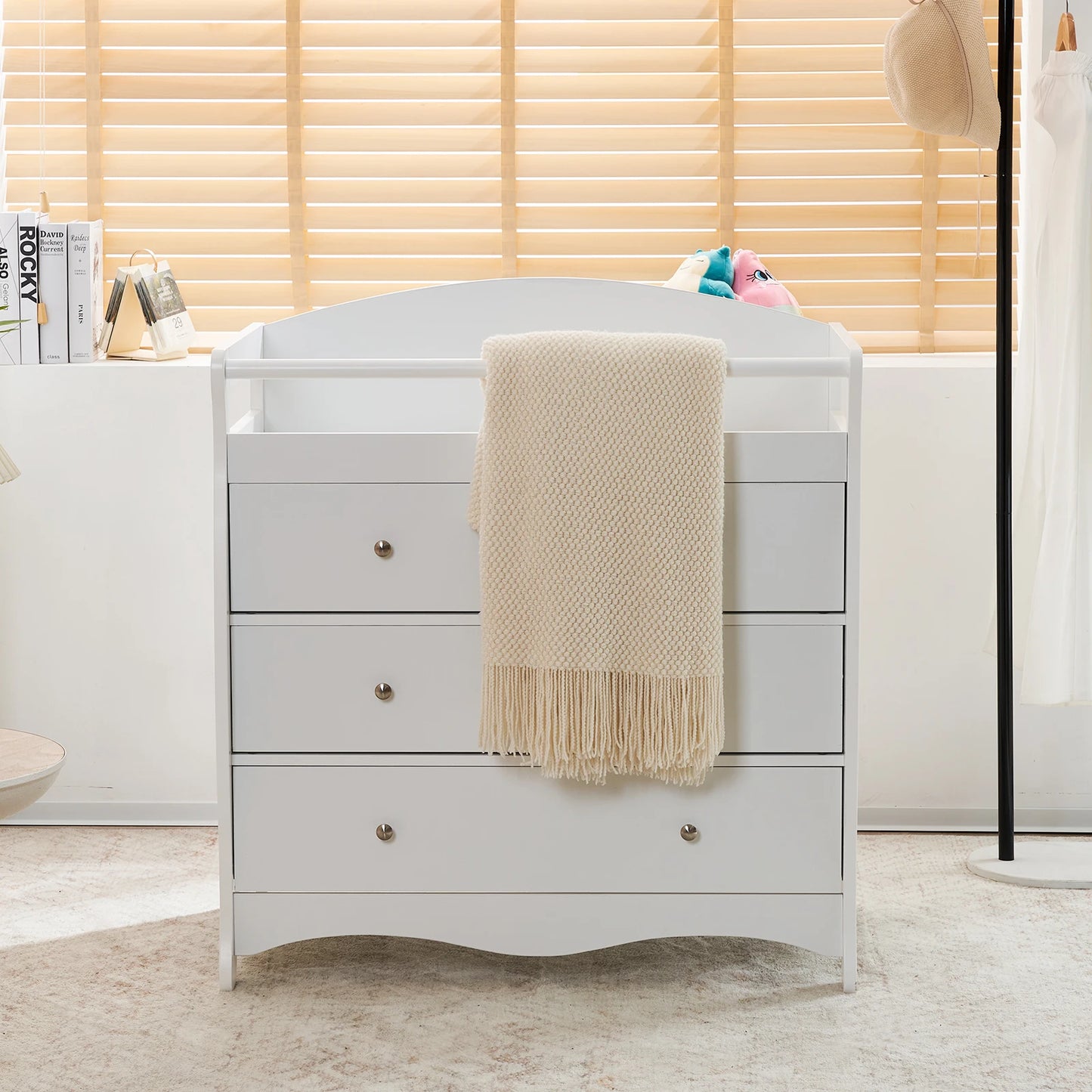 White three-drawer baby crib with safety rail, wooden baby crib with storage combination