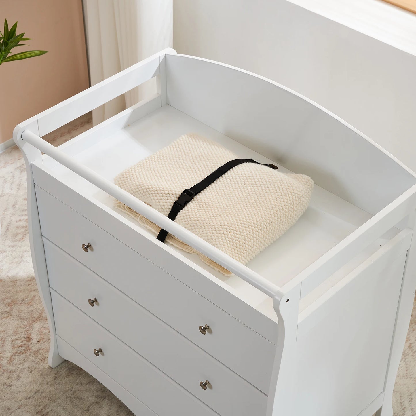 White three-drawer baby crib with safety rail, wooden baby crib with storage combination